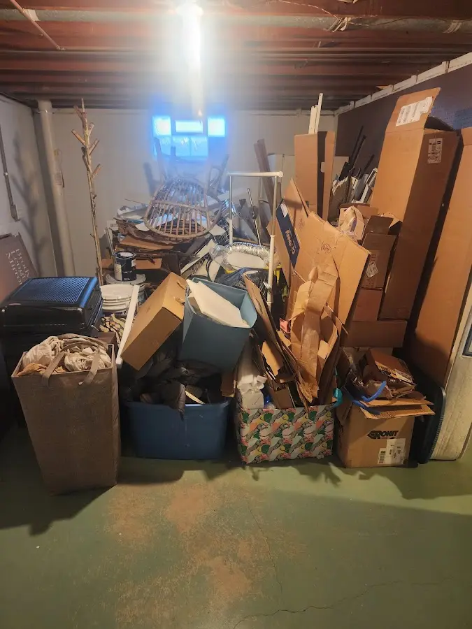 Roll-off dumpster container at job site for 2 Yard Dumpster Rental in Plano